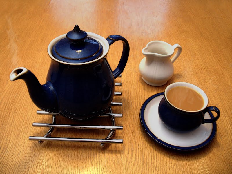 A nice cup of tea (and a sit down). A Denby teapot and cup with milk jug. ? Photo by Vanderdecken, Public domain, via Wikimedia Commons