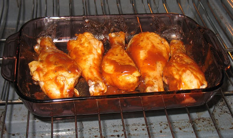 For about 20 minutes in a 350 degree oven. Then turn over, brush on more sauce, and bake for another half hour or so until done. ? Photo by Diana from Pennsylvania USA, CC BY 2.0, via Wikimedia Commons