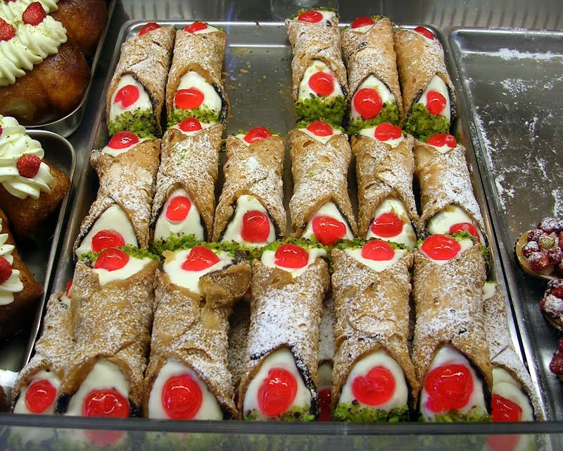Cannoli Siciliani, a typical Sicilan sweet. ? Photo by Stefano Mortellaro from Catania, Italy, CC BY 2.0, via Wikimedia Commons