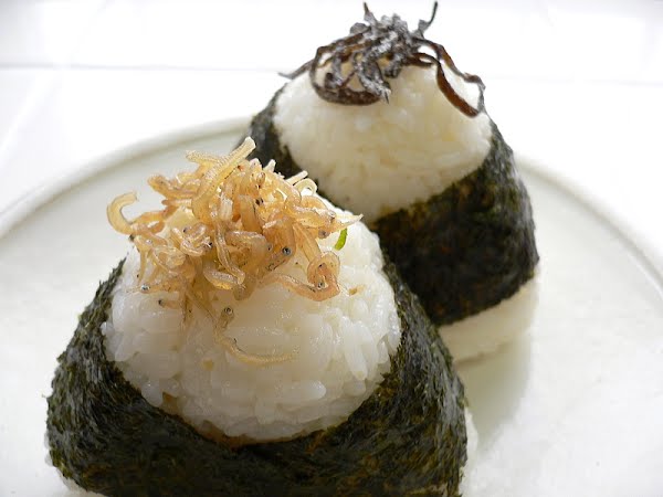 Onigiri. ? Photo by yomi955, CC BY 2.0, via Wikimedia Commons