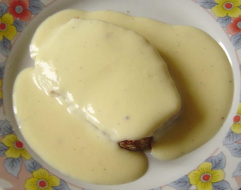 crème anglaise (a kind of custard) and pain d'épices (somewhat like gingerbread) ? Photo by No machine-readable author provided. David.Monniaux assumed (based on copyright claims)., CC BY-SA 3.0, via Wikimedia Commons