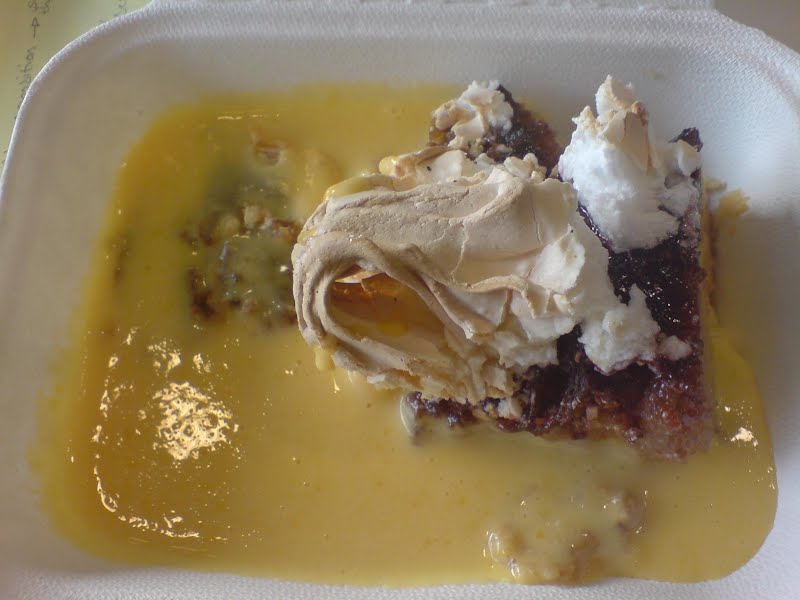 Queen of puddings served with custard ? Photo by Hilary Perkins, CC BY-SA 2.0, via Wikimedia Commons