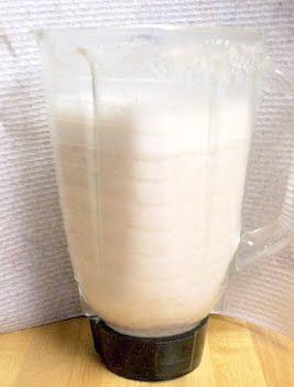 Peanut milk in a blender. Brightened version of the old photo (used the freeware photo tool "Picasa" to simply add light and sharpen it). ? Photo by Guest2424, CC0, via Wikimedia Commons