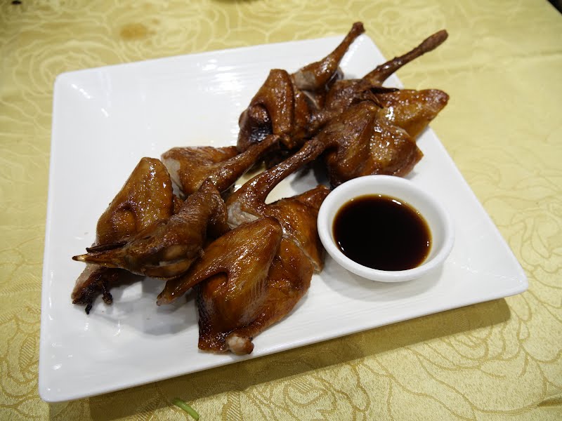 2 of grilled pigeon at KC Seafood Restaurtant in Sam Shing Estate ? Photo by Peachyeung316, CC BY-SA 4.0, via Wikimedia Commons