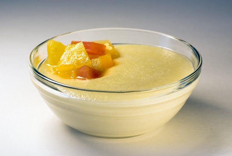 semolina pudding with fruit compote ? Photo by Alice Wiegand, CC BY-SA 3.0, via Wikimedia Commons