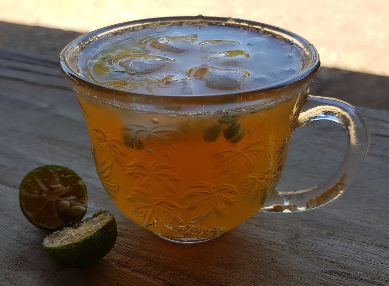 Calamansi juice (Filipino lemonade), sweetened with brown sugar ? Photo by Obsidian Soul, CC0, via Wikimedia Commons