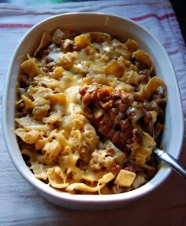 Frito pie as one would commonly see it in the home. "It is exactly as complicated as it sounds ? chili on Fritos. Other accoutrements are optional." ? Photo by Solsticed, CC BY-SA 3.0, via Wikimedia Commons