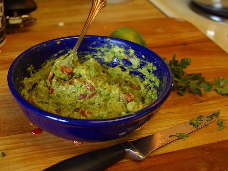 Guacamole in a bowl. Photograph taken with a Canon D60 camera ? Photo by Jon Sullivan, Public domain, via Wikimedia Commons