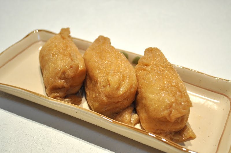 Inarizushi ? Photo by Ocdp, CC BY-SA 3.0, via Wikimedia Commons