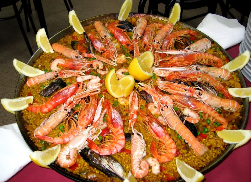 A seafood paella. ? Photo by Manuel M. Vicente from Spain, CC BY 2.0, via Wikimedia Commons