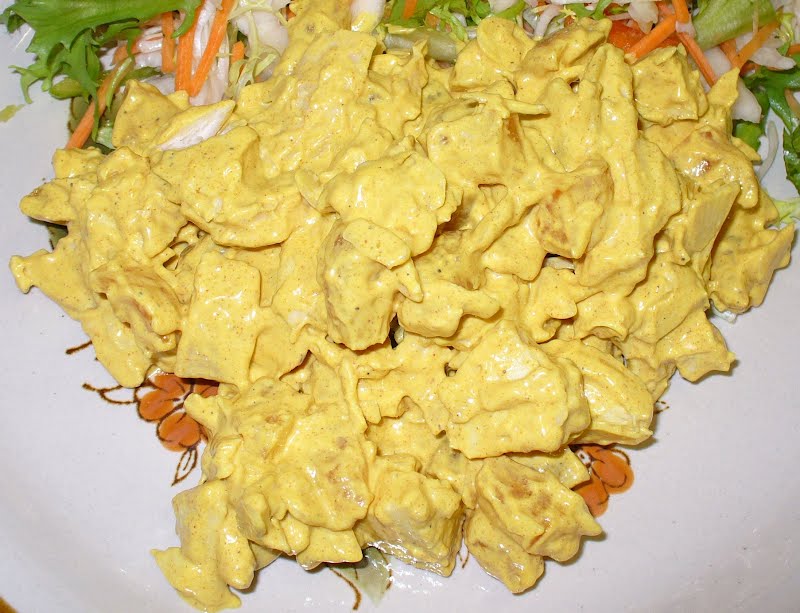 A plate of Coronation Chicken with a salad. ? Photo by James F. Carter, CC BY-SA 2.5, via Wikimedia Commons