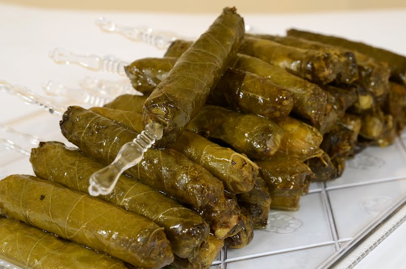 A dish of stuffed vine leaves or "Yaprak", one of the most famous national dishes in the Levant region and Turkey, among other parts of the Middle East ? Photo by Fadyatef, CC BY-SA 3.0, via Wikimedia Commons