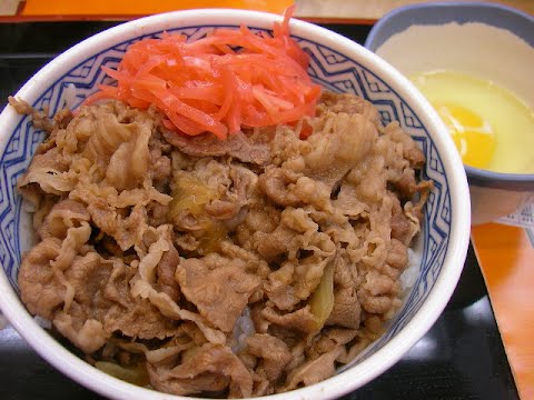 Gyudon at the Yoshinoya. ? Photo by jetalone from Higashi-Ginza, Tokyo, CC BY 2.0, via Wikimedia Commons