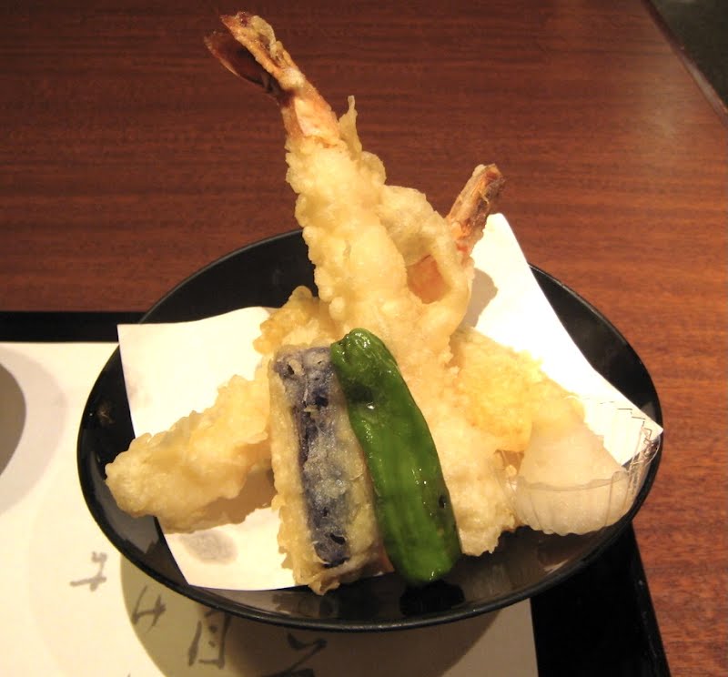 This tempura are sets of two shrimps, an eggplant, a lotus root, and a shishito. A little oily food. ? Photo by Ryusuke, CC BY 2.0, via Wikimedia Commons