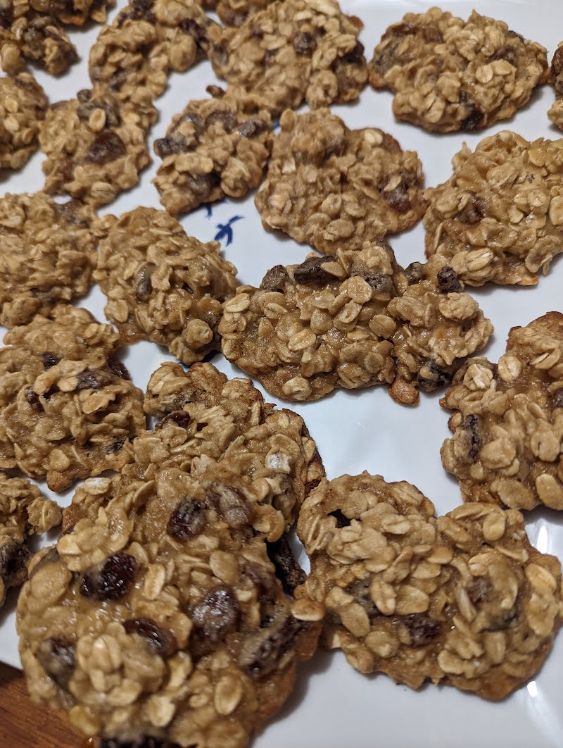 Oatmeal raisin cookies on a white plate. Made from Wikibooks Cookbook recipe. ? Photo by Evan Prodromou, CC0, via Wikimedia Commons
