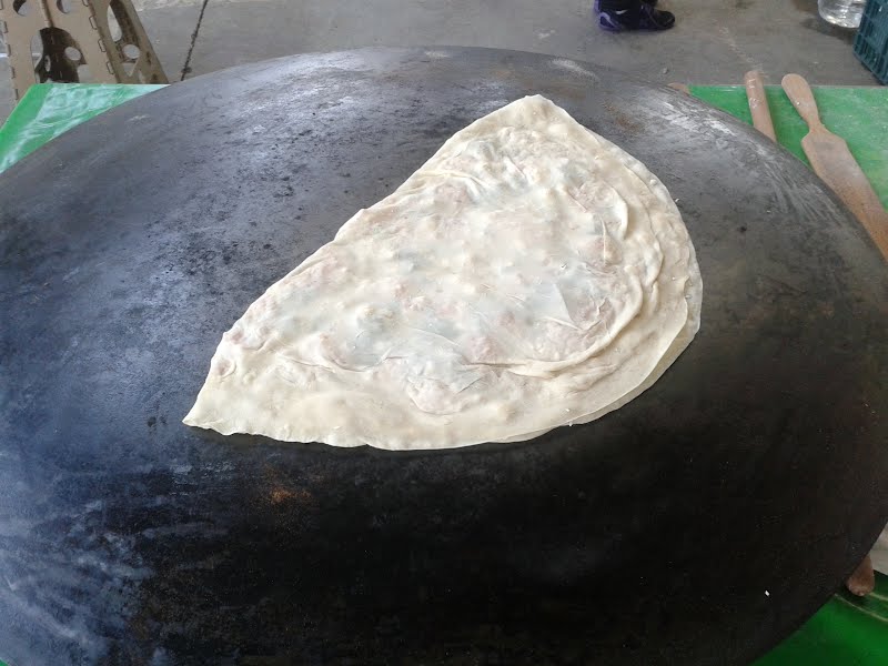 Gözleme being cooked in Ankara. ? Photo by E4024, CC BY-SA 4.0, via Wikimedia Commons