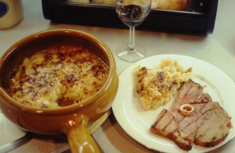 Tartiflette and fried ham. ? Photo by User:Hayford Peirce, Attribution, via Wikimedia Commons