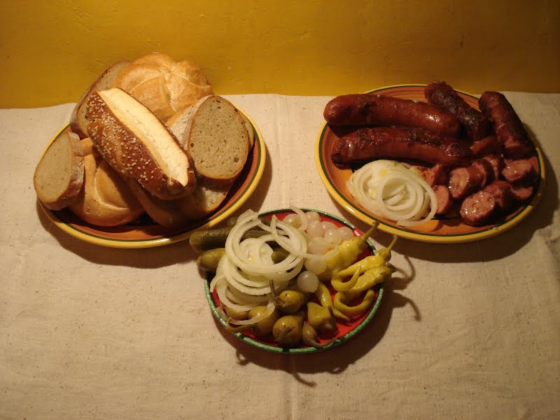 grilled kaesekrainer with accomaniment ? Photo by Sapito, CC BY-SA 3.0, via Wikimedia Commons