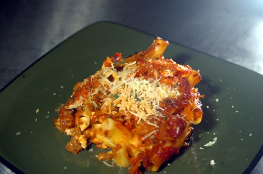 Baked ziti, a dish with beef, 3 cheeses, and Ziti Pasta ? Photo by Lili from NY, United States, CC BY 2.0, via Wikimedia Commons