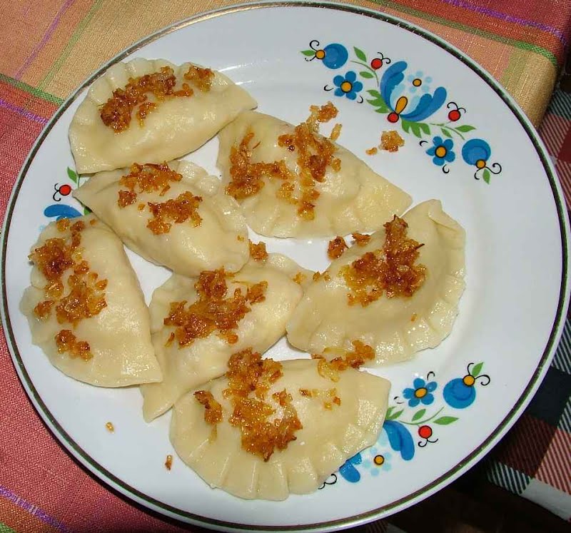Polish pierogi ruskie (Ruthenian dumplings) (pierogi made by wife of User Stako) ? Photo by Stako, CC BY-SA 3.0, via Wikimedia Commons