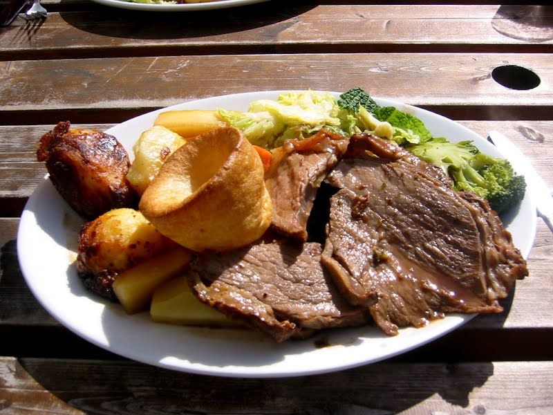 Original caption: The quintessential English Sunday lunch. Roast beef, roast potatoes, vegetables and yorkshire pudding. Actually, the beef was kind of tough. Taken April 17, 2005 with a Canon PowerShot S200. Flickr tags: brighton, food, beef, roast, sunday. ? Photo by Jeremy Keith (Flickr user "adactio"), CC BY 2.0, via Wikimedia Commons